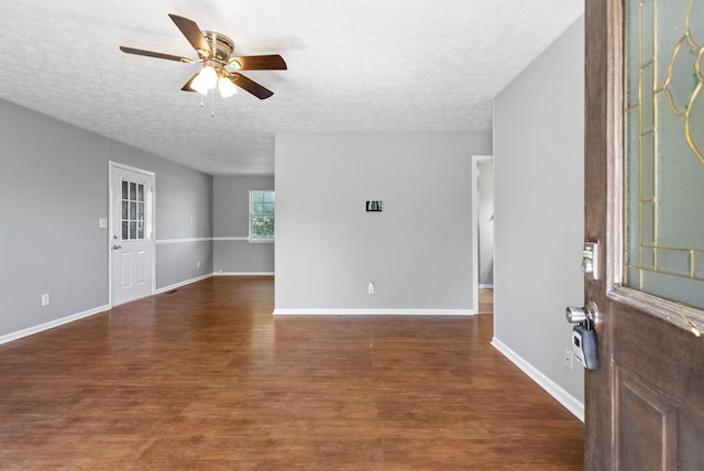 919 Linda Dr, Oak Grove, KY 42262 - empty room featuring a textured ceiling, wood finished floors, ceiling fan, and baseboards