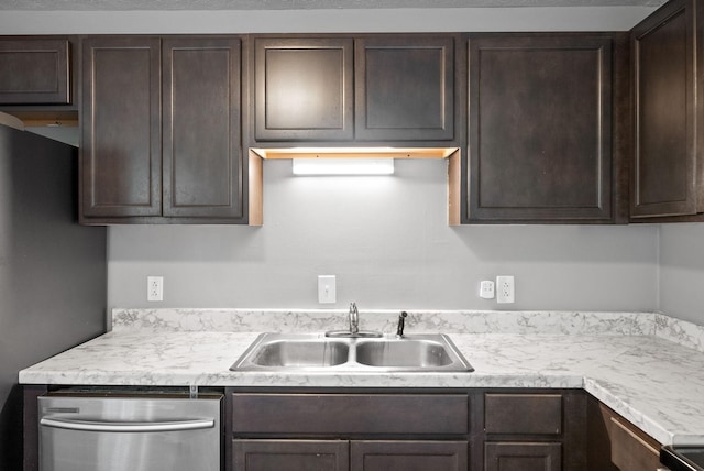 919 Linda Dr, Oak Grove, KY 42262 - kitchen with a sink, dark brown cabinetry, appliances with stainless steel finishes, and light countertops
