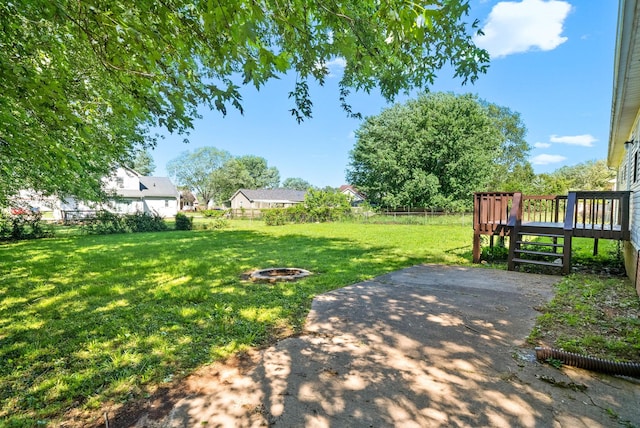 919 Linda Dr, Oak Grove, KY 42262 - view of yard featuring a deck, an outdoor fire pit, and a patio area