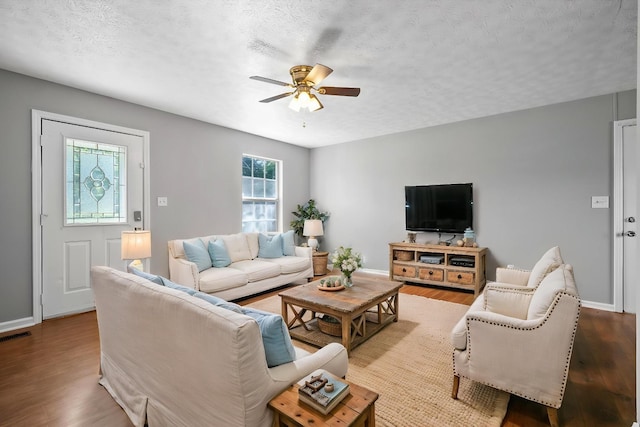 919 Linda Dr, Oak Grove, KY 42262 - living area with light wood-style floors, ceiling fan, a textured ceiling, and baseboards