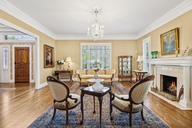 901 Fair St, Franklin, TN 37064 - living room with a chandelier, ornamental molding, wood finished floors, a premium fireplace, and baseboards