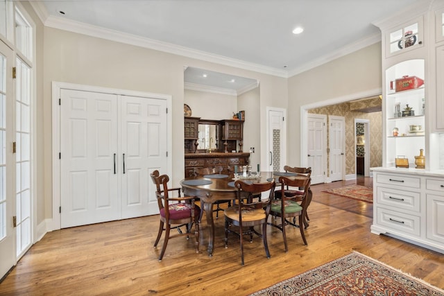 901 Fair St, Franklin, TN 37064 - dining room with light wood finished floors, crown molding, recessed lighting, and baseboards