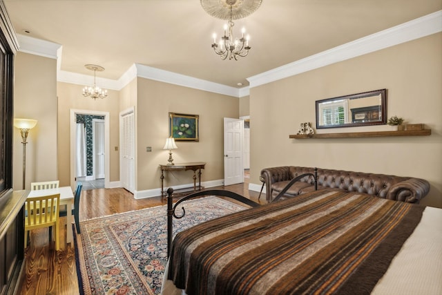 901 Fair St, Franklin, TN 37064 - bedroom featuring a chandelier, wood finished floors, crown molding, and baseboards