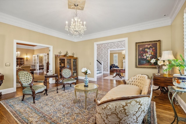901 Fair St, Franklin, TN 37064 - sitting room with baseboards, ornamental molding, a chandelier, and wood finished floors