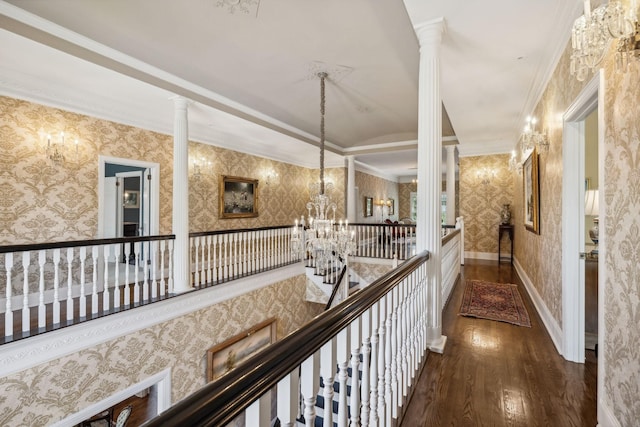 901 Fair St, Franklin, TN 37064 - hallway featuring an upstairs landing, a chandelier, wood finished floors, ornate columns, and wallpapered walls