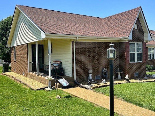 2115 Mockingbird Ln Unit D, Springfield, TN 37172 - back of house with brick siding, a shingled roof, a lawn, and crawl space