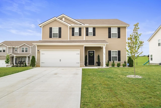 108 Model Ct, Columbia, TN 38401 - view of front of property featuring an attached garage, concrete driveway, a front yard, and board and batten siding