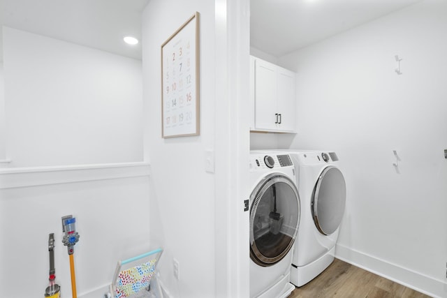 108 Model Ct, Columbia, TN 38401 - laundry area featuring washer and clothes dryer, cabinet space, light wood-type flooring, baseboards, and recessed lighting