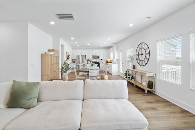108 Model Ct, Columbia, TN 38401 - living area featuring recessed lighting, light wood-style floors, and baseboards