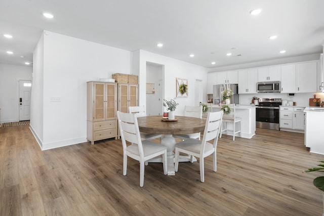 108 Model Ct, Columbia, TN 38401 - dining area with light wood-style floors, recessed lighting, and baseboards