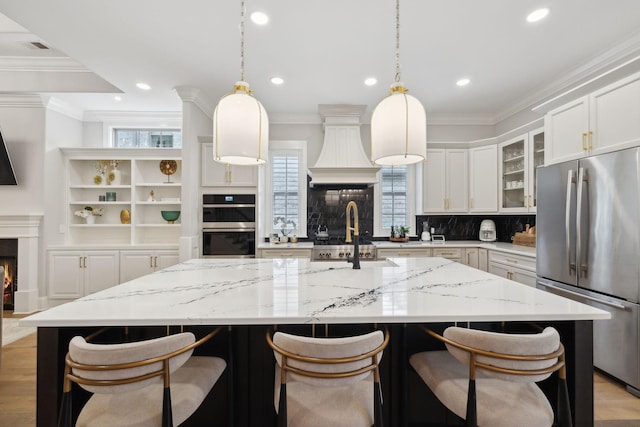 2143 White Poplar Ct, Murfreesboro, TN 37130 - kitchen featuring freestanding refrigerator, a sink, double oven, plenty of natural light, and recessed lighting