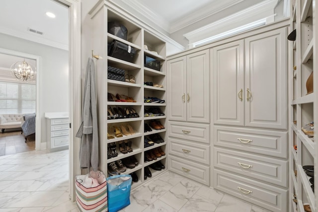 2143 White Poplar Ct, Murfreesboro, TN 37130 - spacious closet with light marble finish flooring and a chandelier