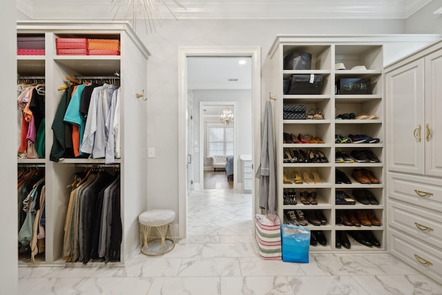 2143 White Poplar Ct, Murfreesboro, TN 37130 - spacious closet with marble finish floors and a chandelier