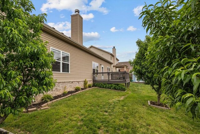 7211 Deervalley Dr, Fairview, TN 37062 - view of green lawn with a deck