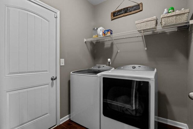 7211 Deervalley Dr, Fairview, TN 37062 - laundry room featuring separate washer and dryer, dark wood finished floors, and baseboards