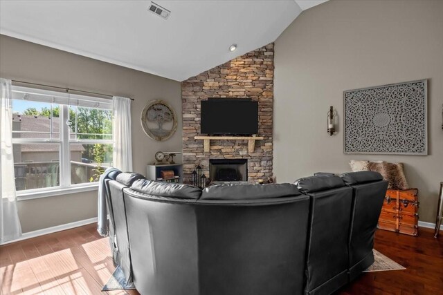 7211 Deervalley Dr, Fairview, TN 37062 - living room featuring lofted ceiling, wood finished floors, baseboards, and a fireplace