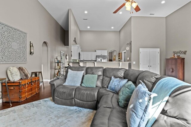 7211 Deervalley Dr, Fairview, TN 37062 - living area with a high ceiling, arched walkways, ceiling fan, wood finished floors, and recessed lighting