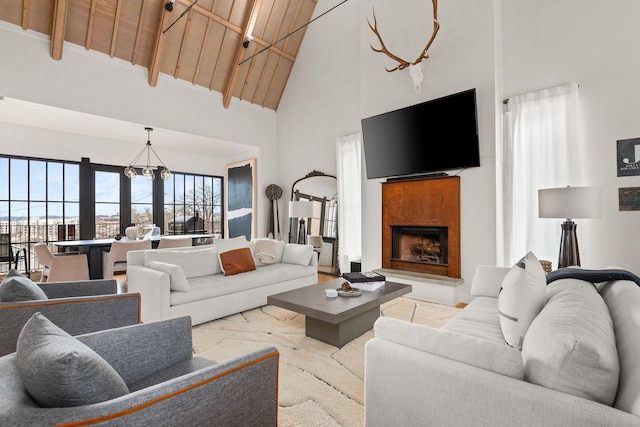 3800 Dakota Ave, Nashville, TN 37209 - living room with high vaulted ceiling, a fireplace with raised hearth, and beam ceiling