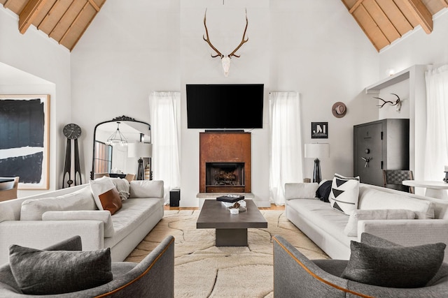 3800 Dakota Ave, Nashville, TN 37209 - living area with high vaulted ceiling, wood ceiling with exposed beams, and a fireplace with raised hearth