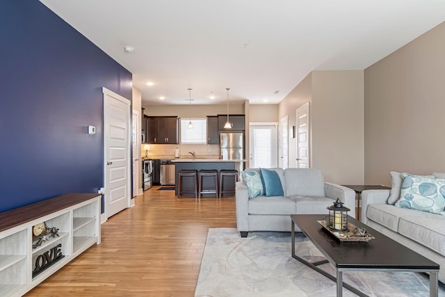 5008 Fennel Ct, Spring Hill, TN 37174 - living room featuring light wood-type flooring and recessed lighting