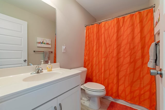 5008 Fennel Ct, Spring Hill, TN 37174 - bathroom with toilet, vanity, a shower with shower curtain, and tile patterned flooring
