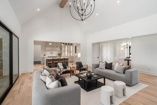 520 Mansion Dr, Brentwood, TN 37027 - living area featuring a chandelier, high vaulted ceiling, light wood-style flooring, beam ceiling, and baseboards