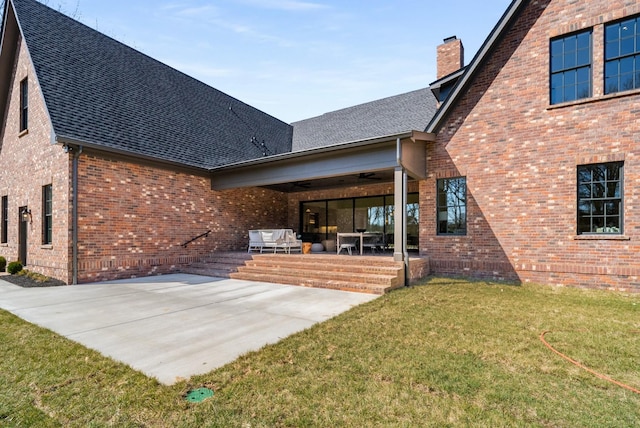 520 Mansion Dr, Brentwood, TN 37027 - rear view of property featuring a chimney, ceiling fan, a yard, and a patio