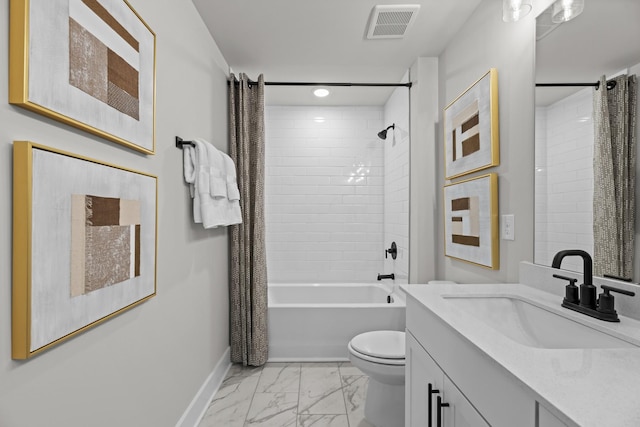 2507H Strong St, Columbia, TN 38401 - bathroom featuring marble look tiles, baseboards, toilet, shower / bath combo, and vanity