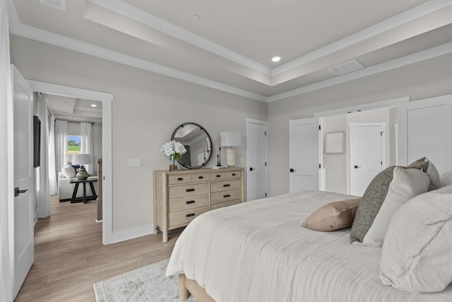 2507H Strong St, Columbia, TN 38401 - bedroom featuring light wood finished floors, a raised ceiling, recessed lighting, ornamental molding, and baseboards