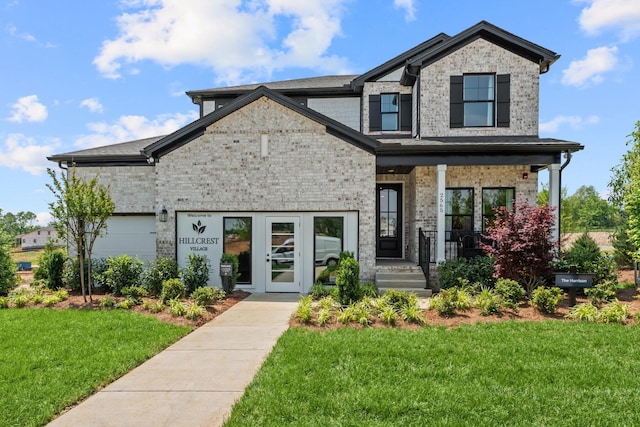 2507H Strong St, Columbia, TN 38401 - view of front of property featuring a front lawn, covered porch, and brick siding