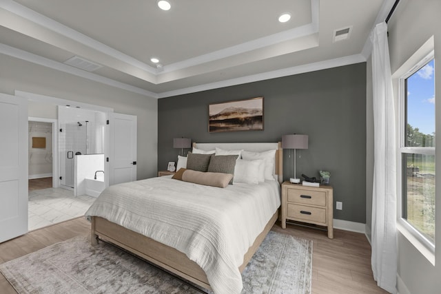 2507H Strong St, Columbia, TN 38401 - bedroom with a raised ceiling, light wood-style floors, recessed lighting, baseboards, and connected bathroom