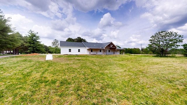 226 Douglas Rd, Murray, KY 42071 - back of property featuring a lawn