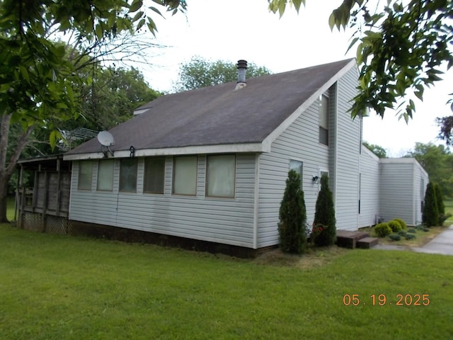 4064 Elizabeth Dr, Hermitage, TN 37076 - view of side of home with a lawn and a shingled roof