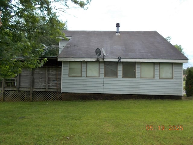 4064 Elizabeth Dr, Hermitage, TN 37076 - back of property with a lawn