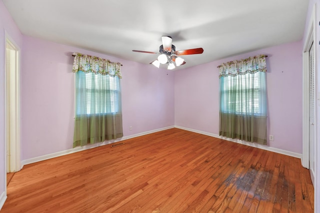 206 Crestland Dr, Columbia, TN 38401 - unfurnished room featuring healthy amount of natural light, hardwood / wood-style flooring, ceiling fan, and baseboards