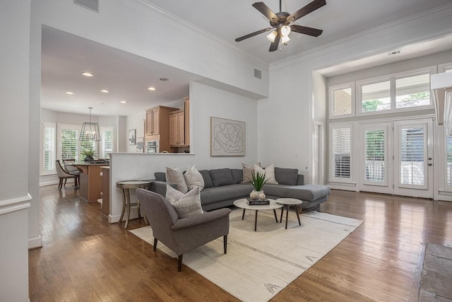 960 Caldwell Ln, Nashville, TN 37204 - living room featuring ceiling fan, wood finished floors, ornamental molding, and recessed lighting