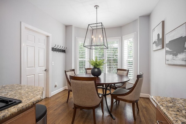960 Caldwell Ln, Nashville, TN 37204 - dining area with a chandelier, dark wood-type flooring, healthy amount of natural light, and baseboards