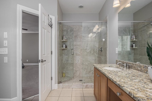960 Caldwell Ln, Nashville, TN 37204 - full bathroom with a stall shower, vanity, baseboards, and tile patterned flooring