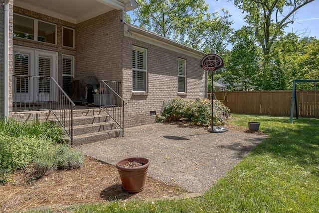 960 Caldwell Ln, Nashville, TN 37204 - view of home's exterior featuring brick siding, a patio, and crawl space
