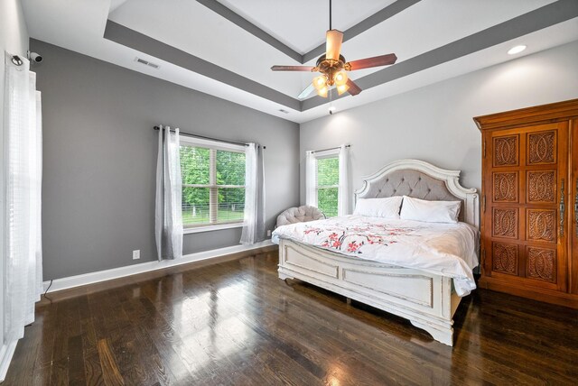 1161 Reda Dr, Clarksville, TN 37042 - bedroom with a raised ceiling, wood finished floors, baseboards, and ceiling fan