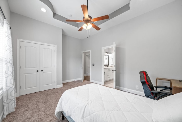 1161 Reda Dr, Clarksville, TN 37042 - bedroom featuring light carpet, baseboards, an office area, a closet, and ceiling fan