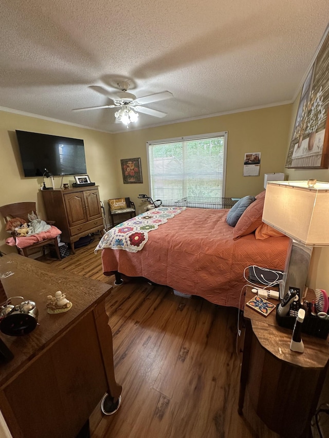 1140 Brittany Park Ln, Antioch, TN 37013 - bedroom featuring wood finished floors, a textured ceiling, ornamental molding, and a ceiling fan