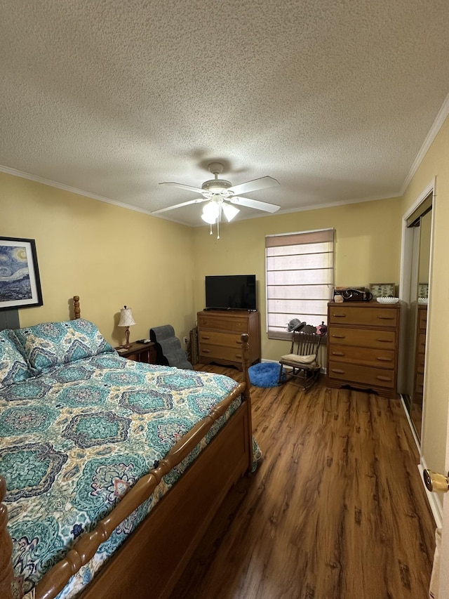 1140 Brittany Park Ln, Antioch, TN 37013 - bedroom with ornamental molding, wood finished floors, a textured ceiling, and ceiling fan
