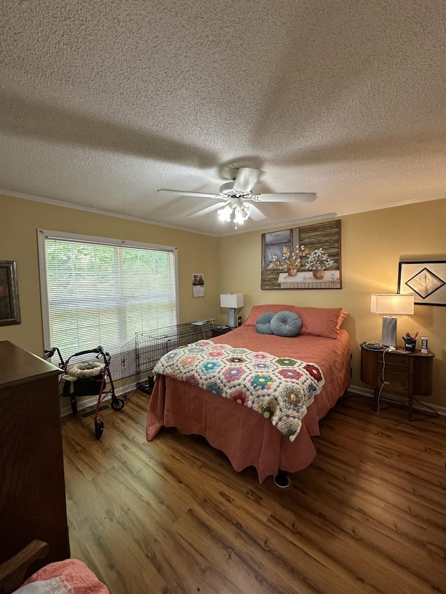 1140 Brittany Park Ln, Antioch, TN 37013 - bedroom with wood finished floors, ornamental molding, a textured ceiling, and ceiling fan
