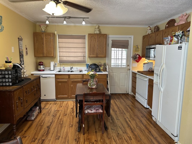 1140 Brittany Park Ln, Antioch, TN 37013 - kitchen featuring white appliances, a sink, a ceiling fan, a textured ceiling, and wood finished floors