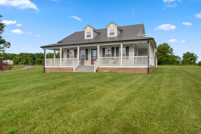 6928 Hoover Mason Ln, Mount Pleasant, TN 38474 - farmhouse with a porch, a front yard, and metal roof