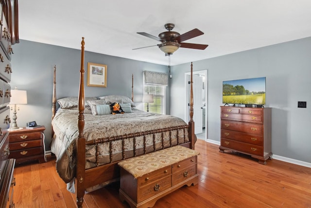 6928 Hoover Mason Ln, Mount Pleasant, TN 38474 - bedroom featuring wood finished floors, baseboards, and a ceiling fan