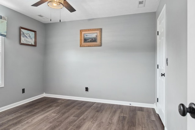 6928 Hoover Mason Ln, Mount Pleasant, TN 38474 - empty room with ceiling fan, dark wood finished floors, and baseboards