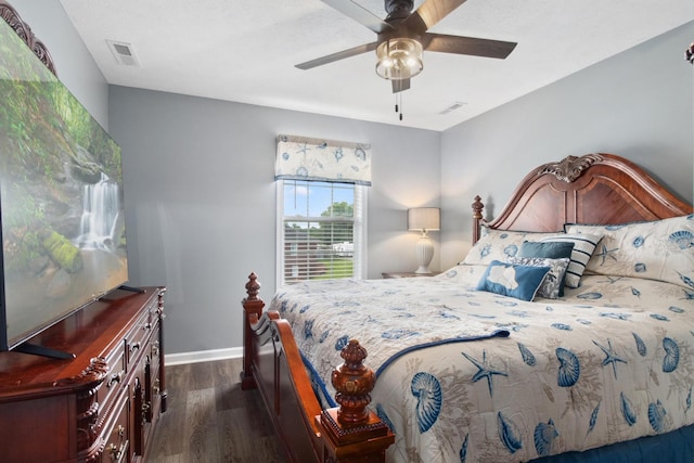 6928 Hoover Mason Ln, Mount Pleasant, TN 38474 - bedroom featuring dark wood-style flooring, baseboards, and a ceiling fan