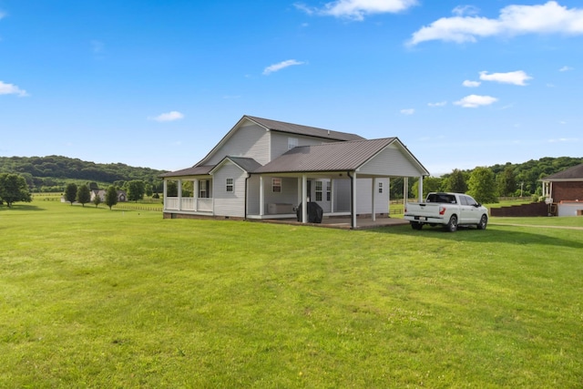 6928 Hoover Mason Ln, Mount Pleasant, TN 38474 - back of property featuring a yard and crawl space
